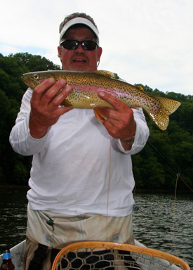 John Emert caught this beautiful rainbow on a #18 caddis dry fly on the Holston River, Tennessee
